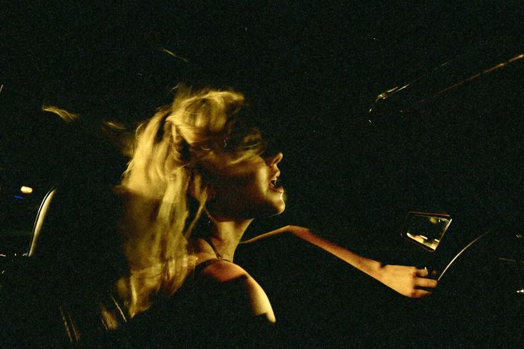 Mood reference: a musician in warm stage light.